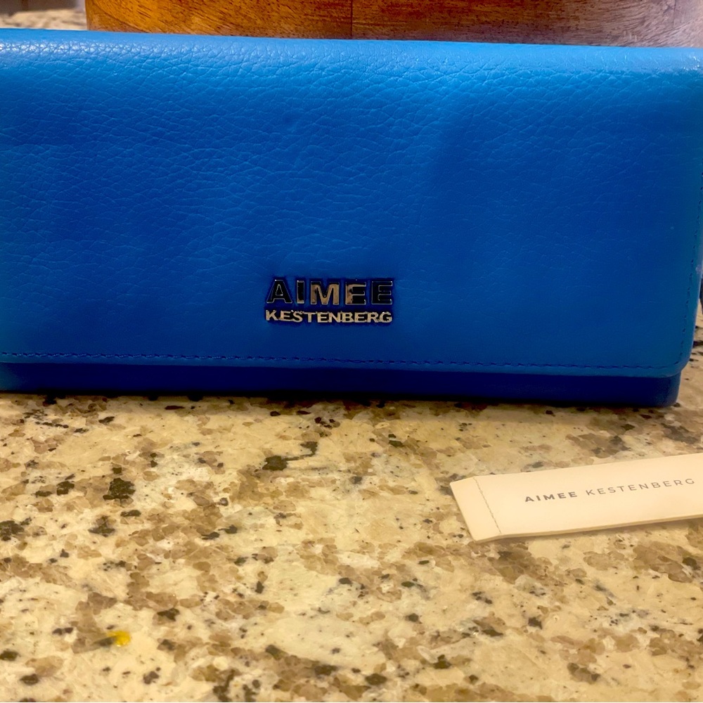 The IT color of the season!  Genuine Leather. Multiple card holder
